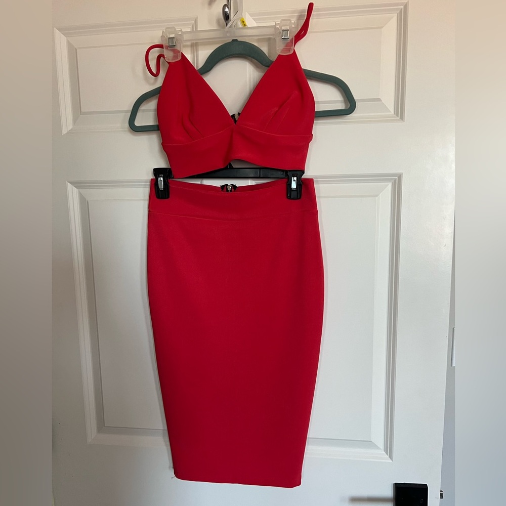 Symphony 2 piece triangle top and pencil skirt set. With zipper detail on back